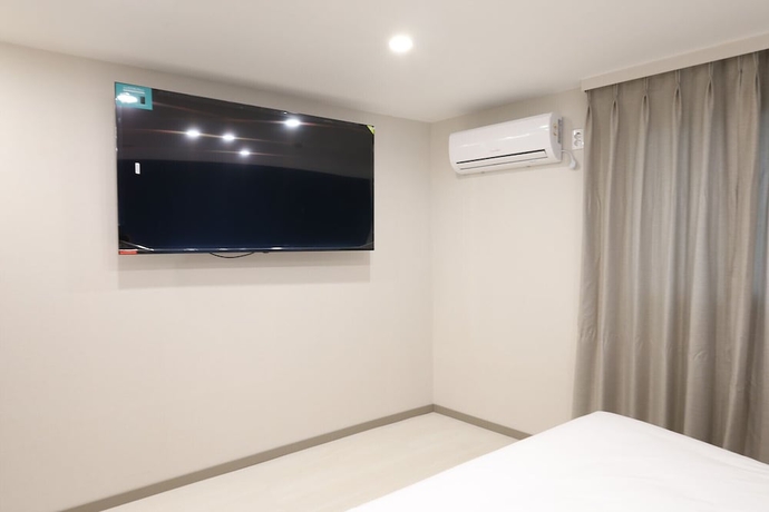Imagen de la habitación del Hotel CALM REST HOTEL GIMHAE. Foto 15