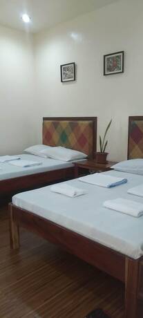 Imagen de la habitación del Hotel CAMIGUIN LANZONES RESORT. Foto 11