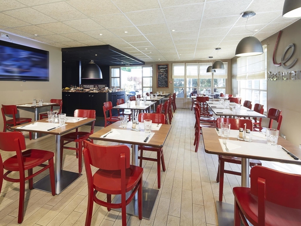 Imagen del bar/restaurante del Hotel CAMPANILE ORLEANS SUD - LA SOURCE. Foto 4