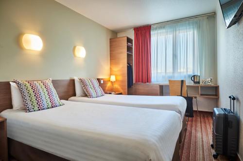 Imagen de la habitación del Hotel CAMPANILE PARIS 12 - Bercy Village. Foto 18