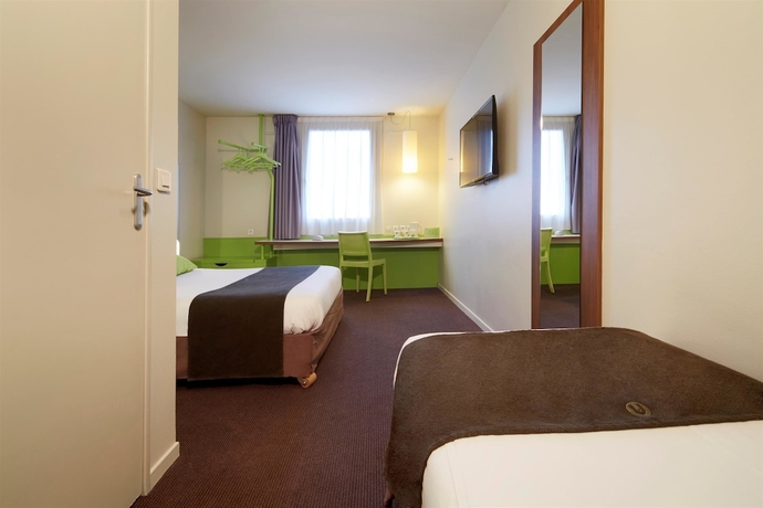 Imagen de la habitación del Hotel CAMPANILE ROISSY - Aéroport CDG - Le Mesnil Amelot. Foto 9