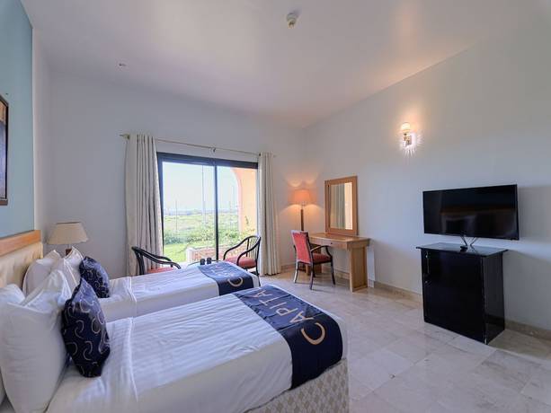 Imagen de la habitación del Hotel CAPITAL O133 Al Sawadi Beach Resort and Spa. Foto 5