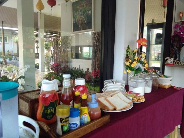 Imagen del bar/restaurante del Hotel CAPITAL O871 Baan Ping Kan Longstay. Foto 11