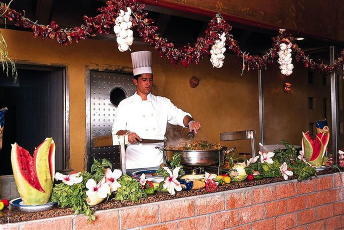 Imagen del bar/restaurante del Hotel CARIBBEAN WORLD BORJ CEDRIA. Foto 3