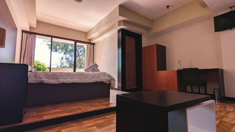 Imagen de la habitación del Hotel CASA BUENA HOTEL. Foto 14