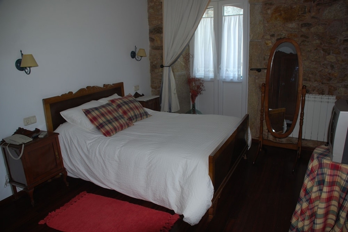 Imagen de la habitación del Hotel CASA DO VENTO HOTEL RUSTICO. Foto 7