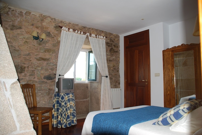 Imagen de la habitación del Hotel CASA DO VENTO HOTEL RUSTICO. Foto 10