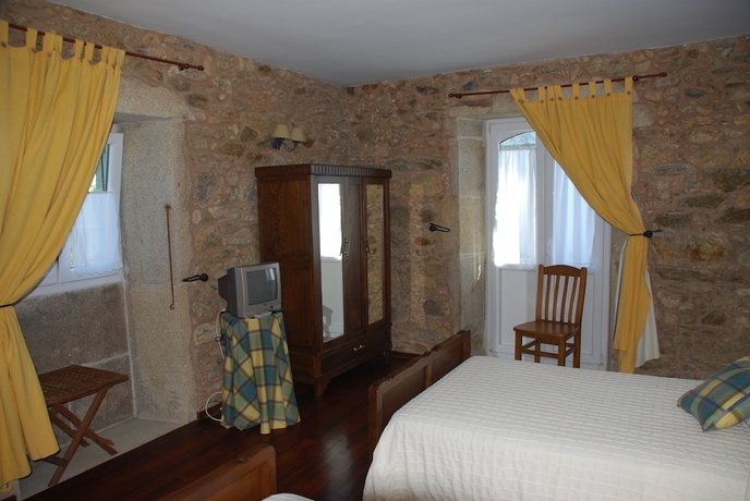 Imagen de la habitación del Hotel CASA DO VENTO HOTEL RUSTICO. Foto 11