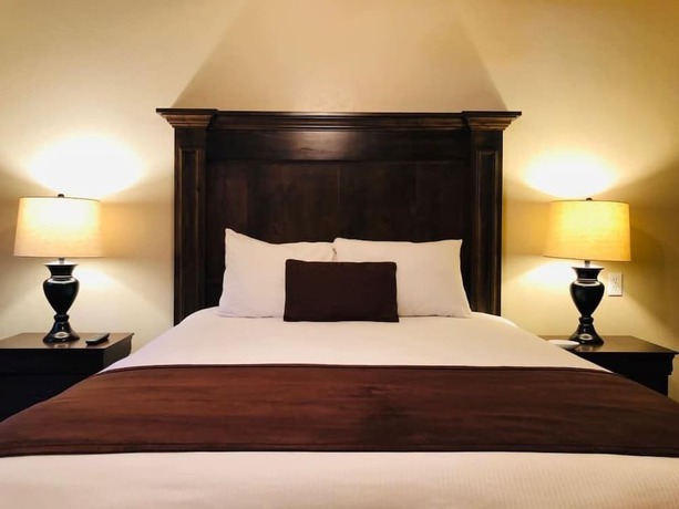 Imagen de la habitación del Hotel CBandM Executive Suites. Foto 12