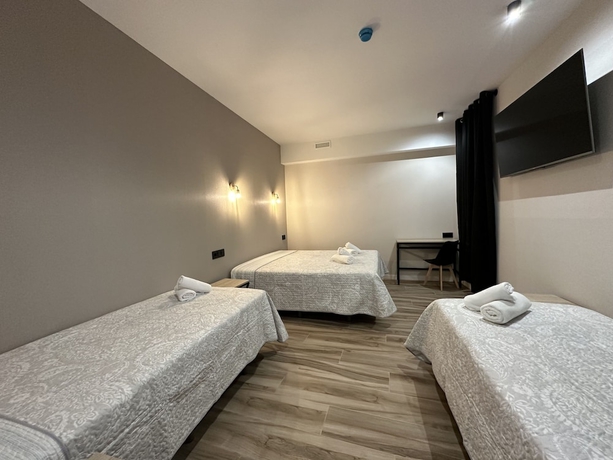 Imagen de la habitación del Hotel CC Opera Suites. Foto 4