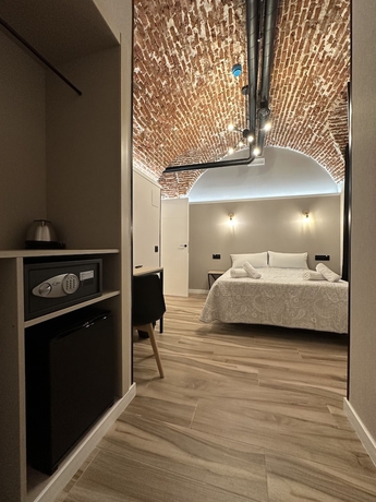 Imagen de la habitación del Hotel CC Opera Suites. Foto 16