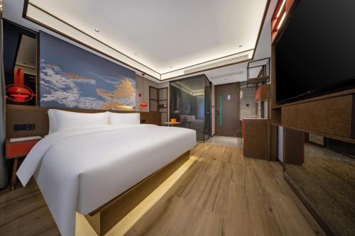 Imagen de la habitación del Hotel CEo茗呈酒店. Foto 18