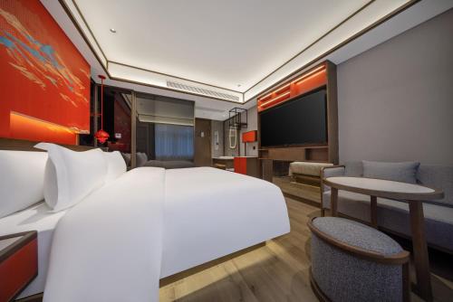 Imagen de la habitación del Hotel CEo茗呈酒店. Foto 19