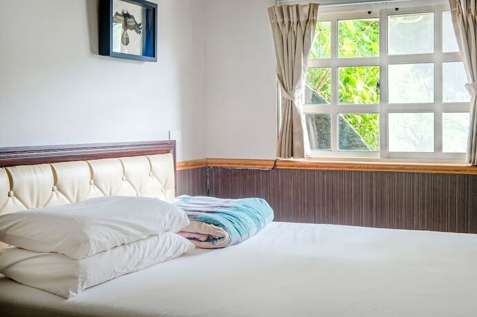 Imagen de la habitación del Hotel CF Kite Homestay. Foto 11