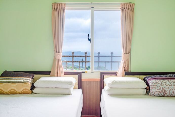 Imagen de la habitación del Hotel CF Kite Homestay. Foto 14