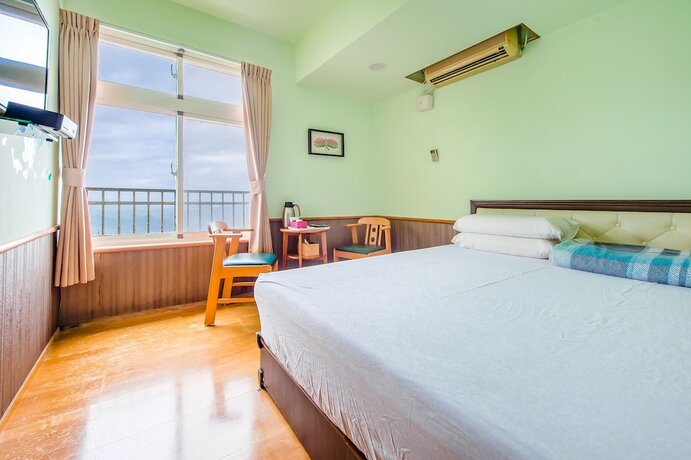 Imagen de la habitación del Hotel CF Kite Homestay. Foto 16