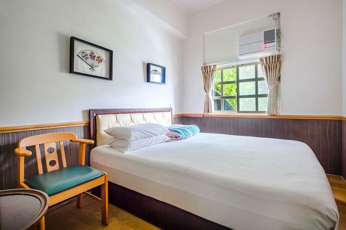 Imagen de la habitación del Hotel CF Kite Homestay. Foto 18