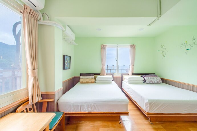 Imagen de la habitación del Hotel CF Kite Homestay. Foto 19