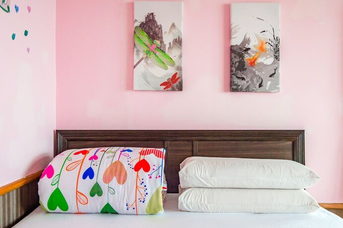 Imagen de la habitación del Hotel CF Kite Homestay. Foto 20