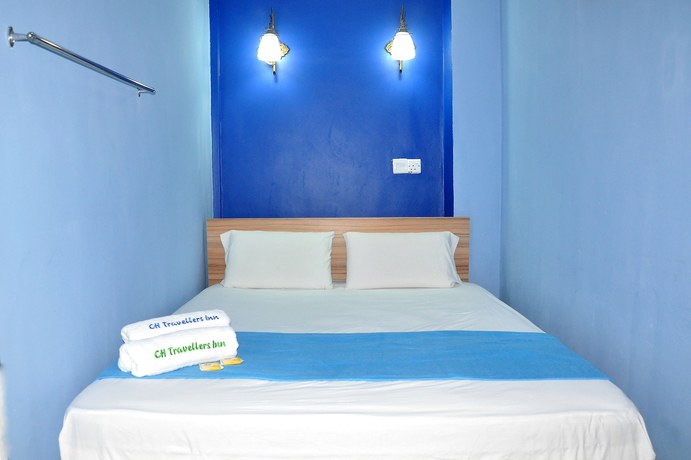 Imagen de la habitación del Hotel CH Travellers Inn. Foto 4