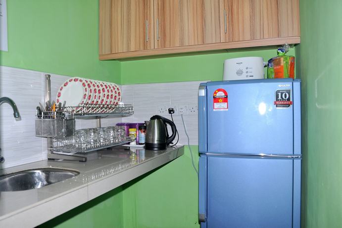 Imagen de la habitación del Hotel CH Travellers Inn. Foto 5