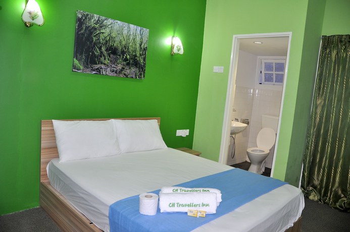 Imagen de la habitación del Hotel CH Travellers Inn. Foto 6