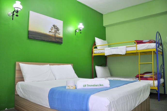 Imagen de los interiores del Hotel CH Travellers Inn. Foto 13