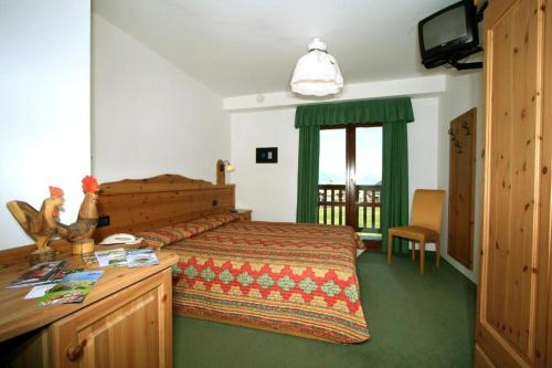 Imagen de la habitación del Hotel CHALET DES ALPES. Foto 12