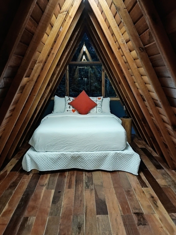 Imagen de la habitación del Hotel CHAL&Eacute;S SUI&Ccedil;OS - Rom&acirc;nticos na Natureza para Adultos. Foto 4