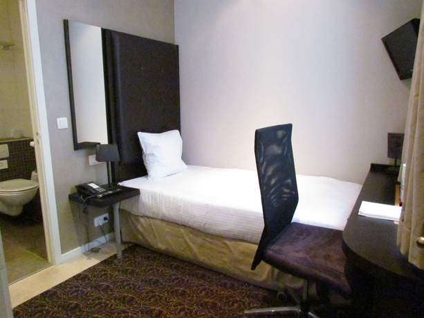 Imagen de la habitación del Hotel CHAMBORD, Bruselas. Foto 12