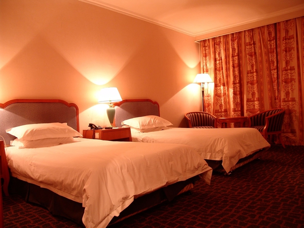 Imagen de la habitación del Hotel CHANG HANG. Foto 2