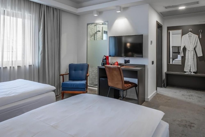 Imagen de la habitación del Hotel CHARM BOUTIQUE HOTEL. Foto 9