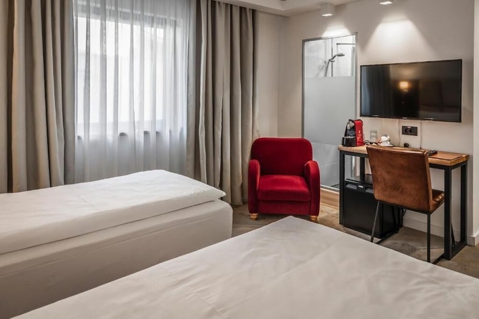 Imagen de la habitación del Hotel CHARM BOUTIQUE HOTEL. Foto 12
