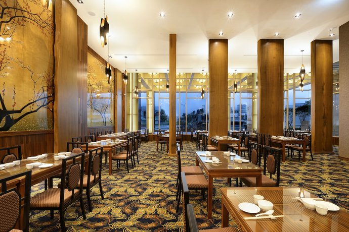 Imagen del bar/restaurante del Hotel CHECK inn Select Tainan YongKang. Foto 5