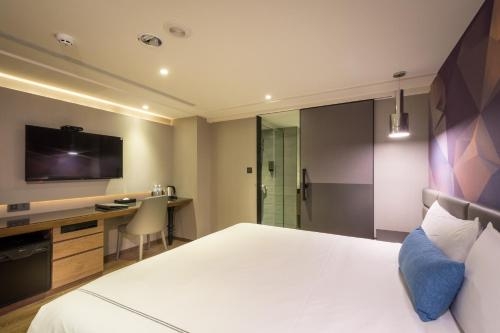 Imagen de la habitación del Hotel CHECK inn Taichung Wenxin Zhongqing. Foto 6