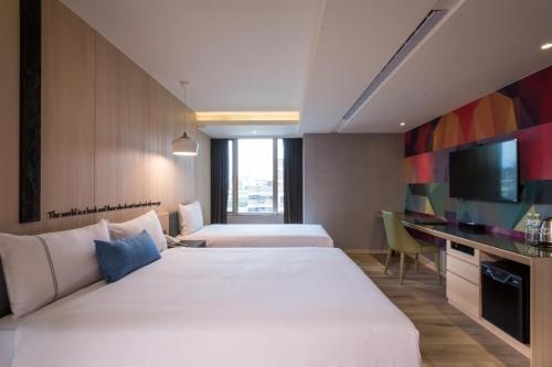 Imagen de la habitación del Hotel CHECK inn Taichung Wenxin Zhongqing. Foto 7