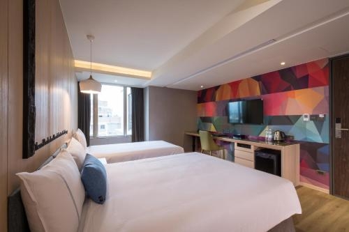 Imagen de la habitación del Hotel CHECK inn Taichung Wenxin Zhongqing. Foto 10