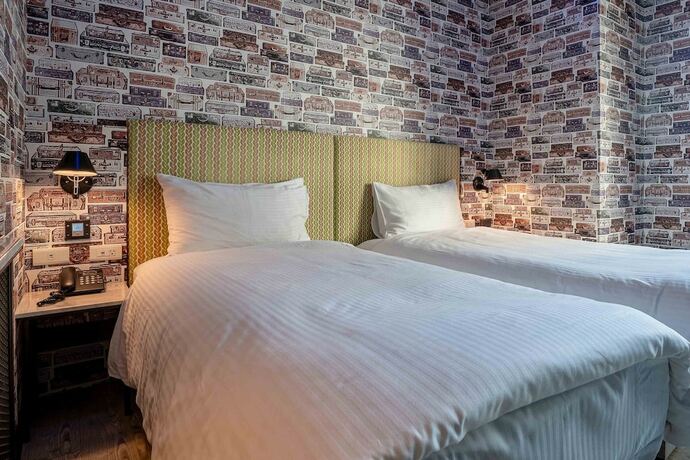 Imagen de la habitación del Hotel CHECK inn Taichung Ziyou. Foto 12