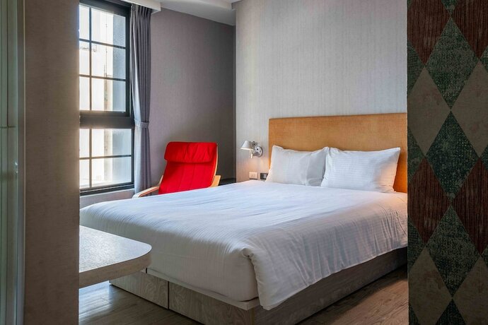 Imagen de la habitación del Hotel CHECK inn Taichung Ziyou. Foto 16