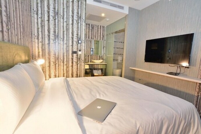 Imagen de la habitación del Hotel CHECK inn Taichung Ziyou. Foto 17