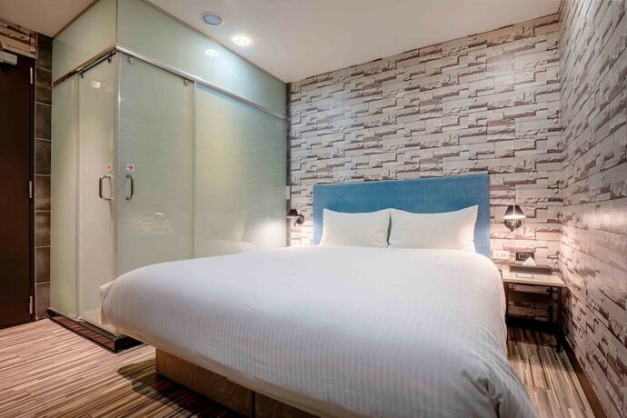 Imagen de la habitación del Hotel CHECK inn Taichung Ziyou. Foto 19