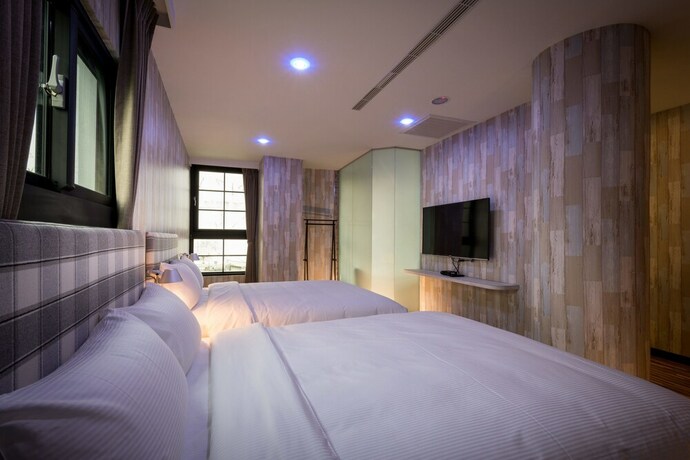 Imagen de la habitación del Hotel CHECK inn Taichung Ziyou. Foto 24