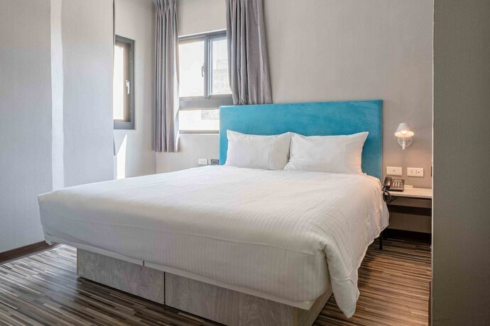 Imagen de la habitación del Hotel CHECK inn Taichung Ziyou. Foto 27