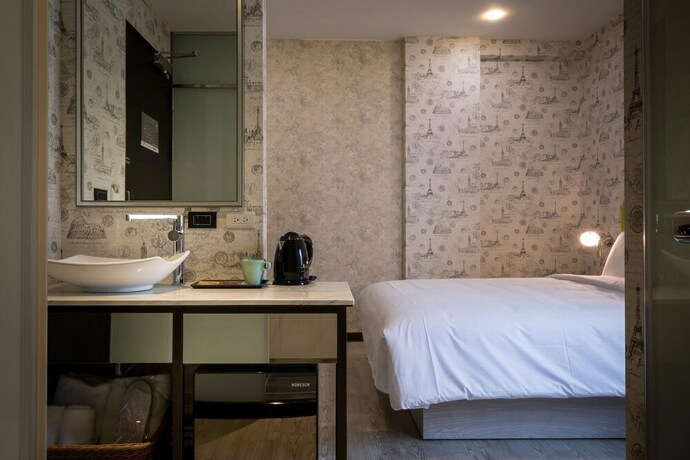 Imagen de la habitación del Hotel CHECK inn Taichung Ziyou. Foto 31