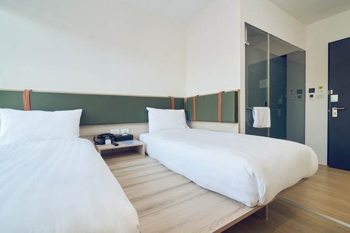 Imagen de la habitación del Hotel CHECKinn Express New Taipei Tamsui. Foto 13