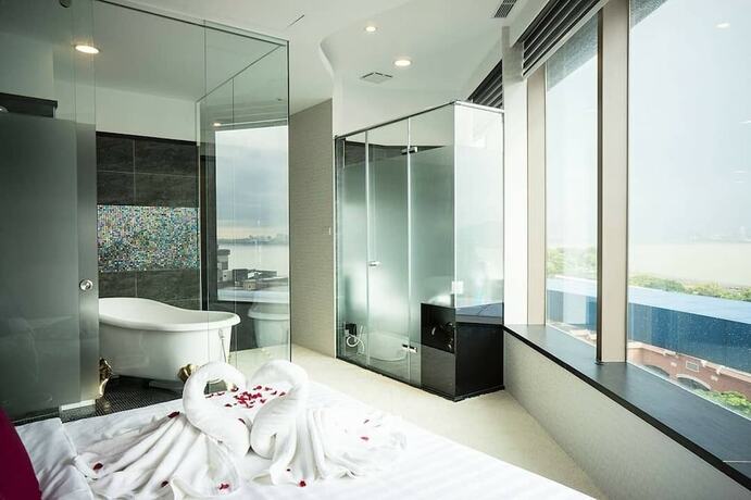 Imagen de la habitación del Hotel CHECKinn Express New Taipei Tamsui. Foto 17