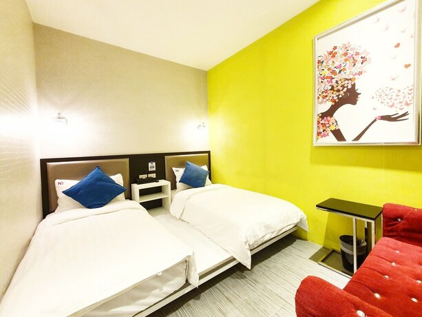 Imagen de la habitación del Hotel CHECKinn Express New Taipei Tamsui. Foto 22