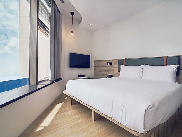 Imagen de la habitación del Hotel CHECKinn Express New Taipei Tamsui. Foto 24