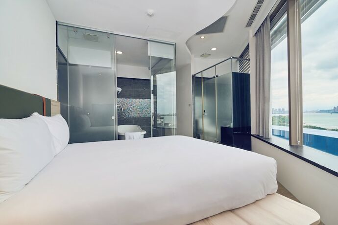 Imagen de la habitación del Hotel CHECKinn Express New Taipei Tamsui. Foto 26