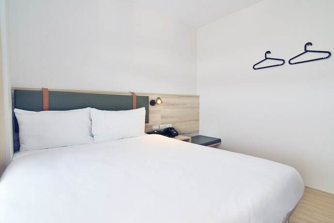 Imagen de la habitación del Hotel CHECKinn Express New Taipei Tamsui. Foto 27